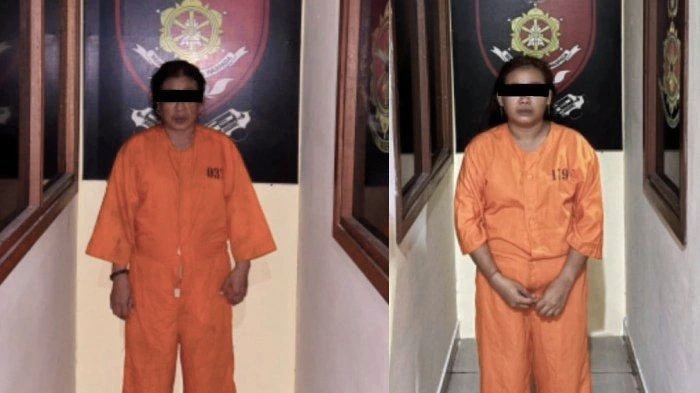 Tersangka perempuan kasus pencurian di toko busana Muslim Bali saat diamankan polisi.