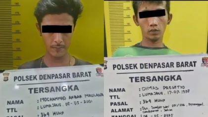 Dua tersangka pencurian kabel tembaga, Dimas Prasetyo (kanan) dan Mochammad Akbar Maulana (kiri), saat diamankan di Polsek Denpasar Barat. Keduanya dijerat Pasal 364 KUHP tentang pencurian ringan.